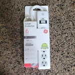 6-OUTLET Surge Protector, 3FT Cord, 800 Joules, Childproof, White. Fixed Price $12.99.