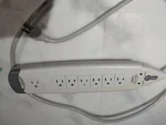 Belkin Surge Protector Strip 7 Outlets With Addtional RJ-11 Protection. Fixed Price $9.99.