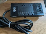 Tripp Lite 7 Outlet Surge Protector Power Strip, 12FT Long Cord. Fixed Price $26.99.