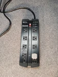 Belkin 8-OUTLET Surge Protector With 12-FEET Power Cord. Fixed Price $18.99.