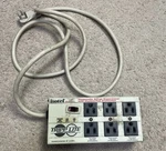 Tripp Lite Isotel Ultra Surge Suppressor 6-OUTLET 120V Working Condition. Fixed Price $32.00.