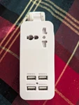 Portable Etpocket 4-PORT Usb Charging Station With Universal Power Socket. Fixed Price $10.00.