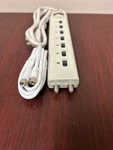 Tesco 4PC: 7 Outlet Surge Strip With Coax Protection. Fixed Price $15.00.