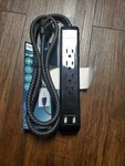 Philips 4-OUTLET Surge Protector W/2 Usb Ports & 4' Braided Cord Black. Fixed Price $17.00.
