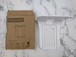 Wall Outlet Shelf Charging Stand White. Fixed Price $9.00.