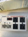 Tripp Lite Isotel 4 Ultra Datacom Surge Protector, Outlet,gray 12A See Picture. Fixed Price $44.00.
