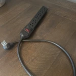 Portable Surge Protector Black Extension Cord 125 V. Fixed Price $10.20.