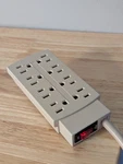 Iii Woods 15A Power Strip Surge Protector W/ 8 Outlets & 2 Ft Cord Beige #6675. Fixed Price $11.99.
