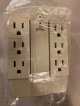 Globe Electric 6 Outlet Swivel Surge Protector Wall - New No Box. Fixed Price $5.00.