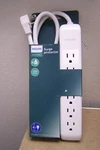 New Philips 6-OUTLET Surge Protector With 4FT Extension Cord Smooth White. Fixed Price $8.99.