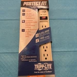 Tripp Lite Surge Protector. Fixed Price $11.00.