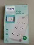 Philips 6-OUTLET Surge Protector Black White 8 Feet Cord. Fixed Price $17.00.