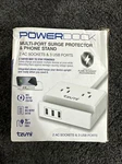Tzumi Power Dock 2-OUTLET Multi-port Surge Protector Phone Stand White. A7. Fixed Price $19.99.
