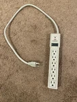 Conext Outlet Surge Protector - 15A Max Load 120VAC 60HZ Model CNS63. Fixed Price $13.00.