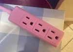 Pink 3-OUTLET Indoor Power Strip, 1 Ft Cord, Plastic, United States Plug. Fixed Price $40.00.