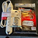 New Sealed 3 Piece Misc. Lot(power Strip,window Bracket,sofa Cover). Fixed Price $25.00.