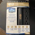 Surge Protector 2100 Joules Tripp Lite AVSWIV6 RJ11 Coax Swivel Outlet *new*. Fixed Price $19.99.