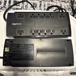 Amazon Basics Rectangle 12-OUTLET Power Strip Surge Protector, 10-FOOT Cord. Fixed Price $20.00.