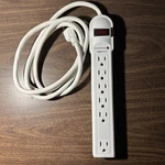 Amazonbasics 6-OUTLET Surge Protector 790 Joule Power Strip MW1702W. Fixed Price $8.99.