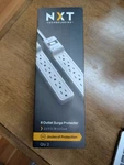 Nxt Technologies NX54311 6 Outlet Surge Protector Power Strip 2.5 Ft Cord 500 J. Fixed Price $12.99.