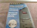 Surge Protector, DX-SP100181, Coax/cable, 6' Cord, 7 Outlets, Home Theater, New. Fixed Price $9.50.