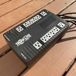 Tripp Lite 900VA Battery Backup Ups 12-OUTLETS Black (AVR900U). Fixed Price $120.00.