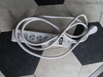 6-OUTLET Grounded Power Strip Long Extension Cord In White. Fixed Price $6.99.