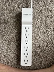 Belkin BE107200-12 7-OUTLET Home/office Surge Protector (6FT Cord). Fixed Price $10.00.