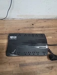 Tripp Lite 900VA Battery Backup Ups 12-OUTLETS Black (AVR900U). Fixed Price $89.99.