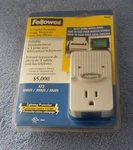 Follwes Outlet Portable Surge Protector With Fax/phone 99013. Fixed Price $14.00.