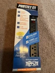 Tripp Lite TLP76RBTEL Outlet Surge Protector Black, New. Fixed Price $5.00.