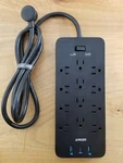 Anker 351 12 Outlets Power Strip Usb Charger Surge Protector Flat Plug 5FT. Fixed Price $27.00.