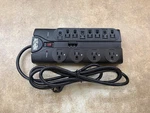 Tripp Lite TLP1208TEL Outlet Power Strip Surge Protector. Fixed Price $33.99.