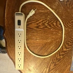 Power Center 6-OUTLET Surge Protector Beige 110-S6, Short Cord, On/off Switch. Fixed Price $12.99.
