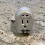 Tripp Lite Spikecube AGIP82186 1-OUTLET 600-JOULE Surge Suppressor Works. Fixed Price $10.49.