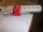 Staples 6-OUTLET 312 Joules Surge Protector Power Strip With Ft. Cord. Fixed Price $15.99.