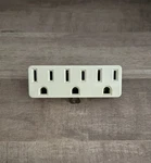 Leviton R43-698-W Grounding Triple Outlet Adapter. Fixed Price $9.95.