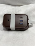Uncaged Ergonomics Travel Charger Multiple Devices Power Strip - Brown. Fixed Price $23.94.